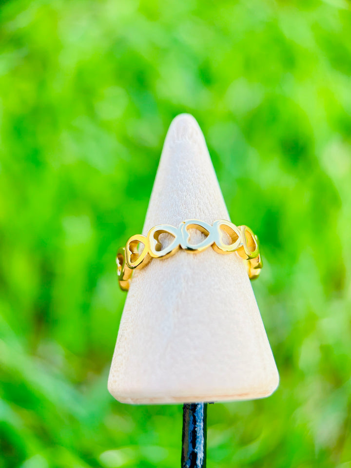 Sortija de siluetas de corazones