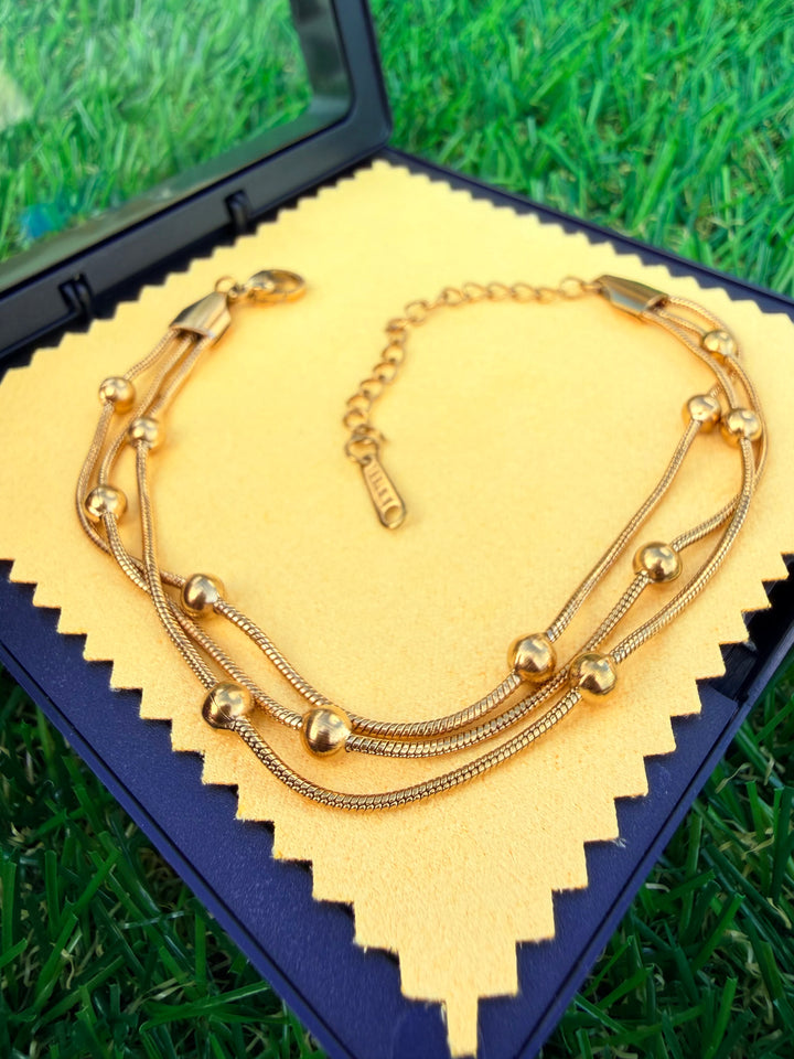 Pulsera Triple Oro