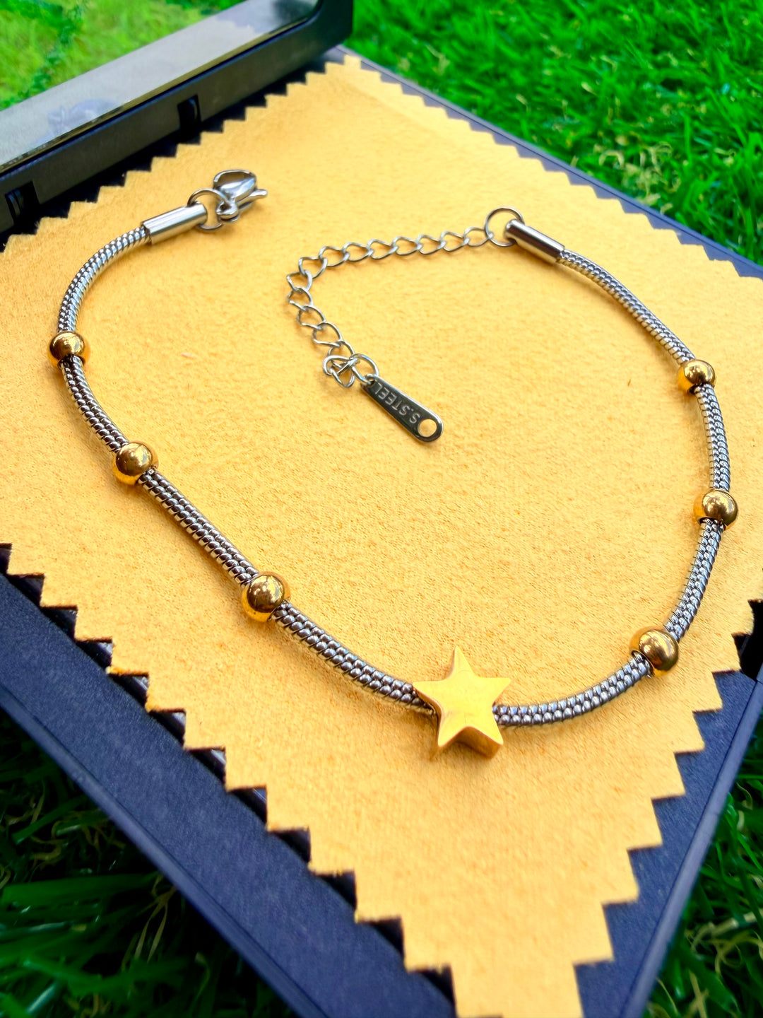 Pulsera de Estrella Doble Tono