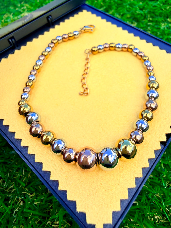 Pulsera de bolitas Threecolor